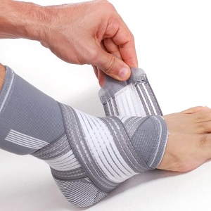 Neotech Care Tobillera (1 unidad) – Tela elástica y transpirable – Correa de compresión ajustable – para hombres, mujeres, jóvenes – pie izquierdo o derecho – Color gris (talla XL)